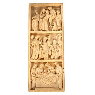 Appraisal: An ivory relief in Gothic style in three registers showing