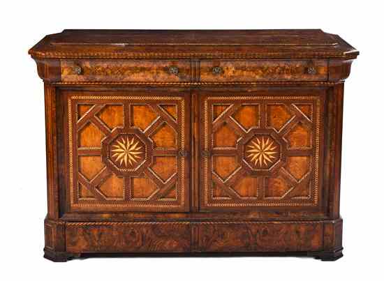 Appraisal: A Continental Burlwood Sideboard having a rectangular top with canted