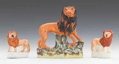 Appraisal: Three Lion Figurines Including a pair of miniature lions -