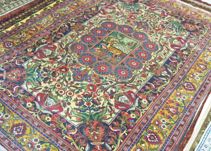 Appraisal: PERSIAN KERMANSHAH CARPET floral and central pictorial medallion design on