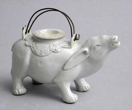 Appraisal: CHINESE IVORY-GLAZED PORCELAIN RABBIT-FORM BOWL AND ASSOCIATED COVER With head