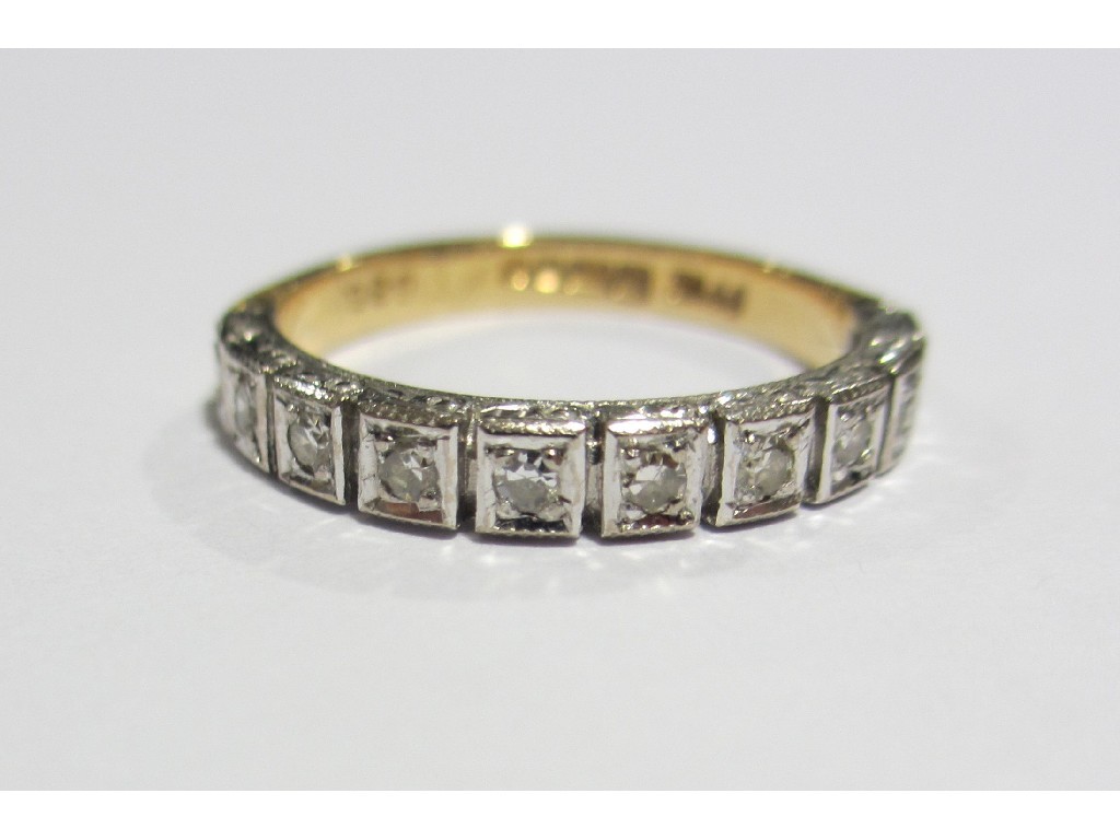 Appraisal: A diamond half hoop eternity ring with ten square set