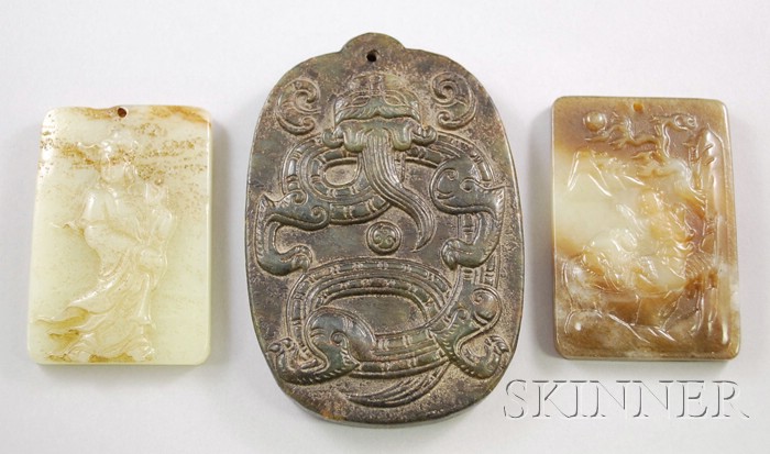 Appraisal: Three Asian Jade Pendants two depicting dragons one a standing