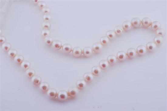 Appraisal: A STRAND OF FRESHWATER PEARLS TO A STERLING SILVER CLASP