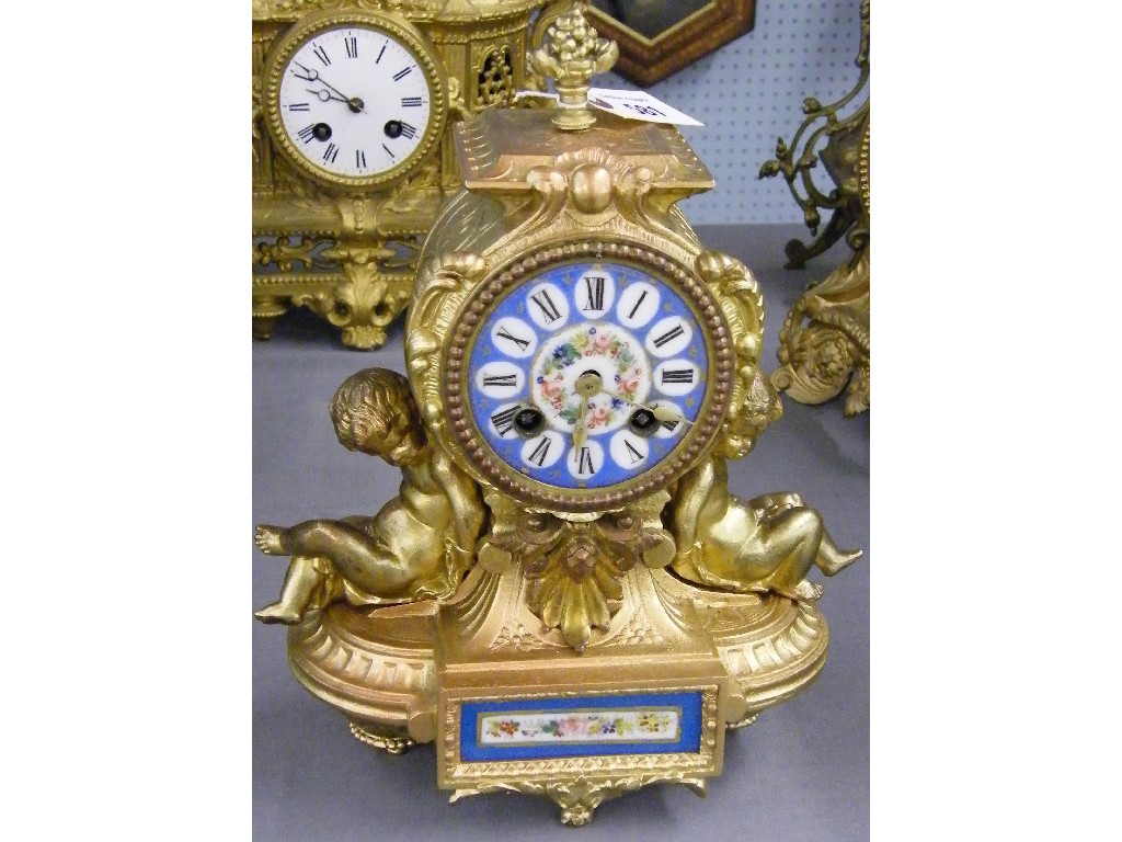 Appraisal: French gilded spelter and porcelain mounted drumhead two train mantel