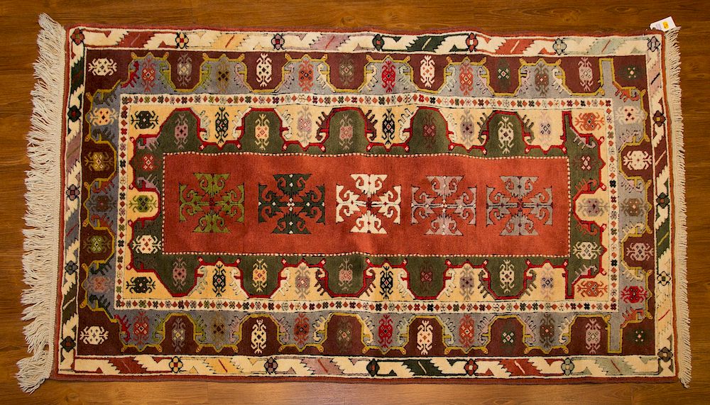 Appraisal: Turkish Konya Rug x hand knotted wool foundation Condition Appears