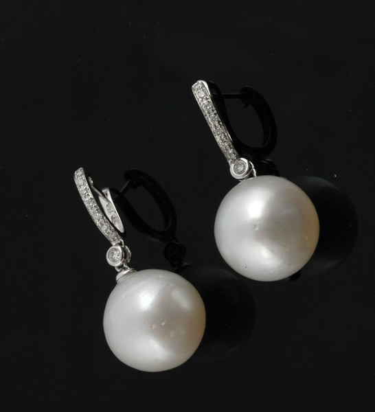 Appraisal: A pair of South Sea pearl and diamond earrings Each