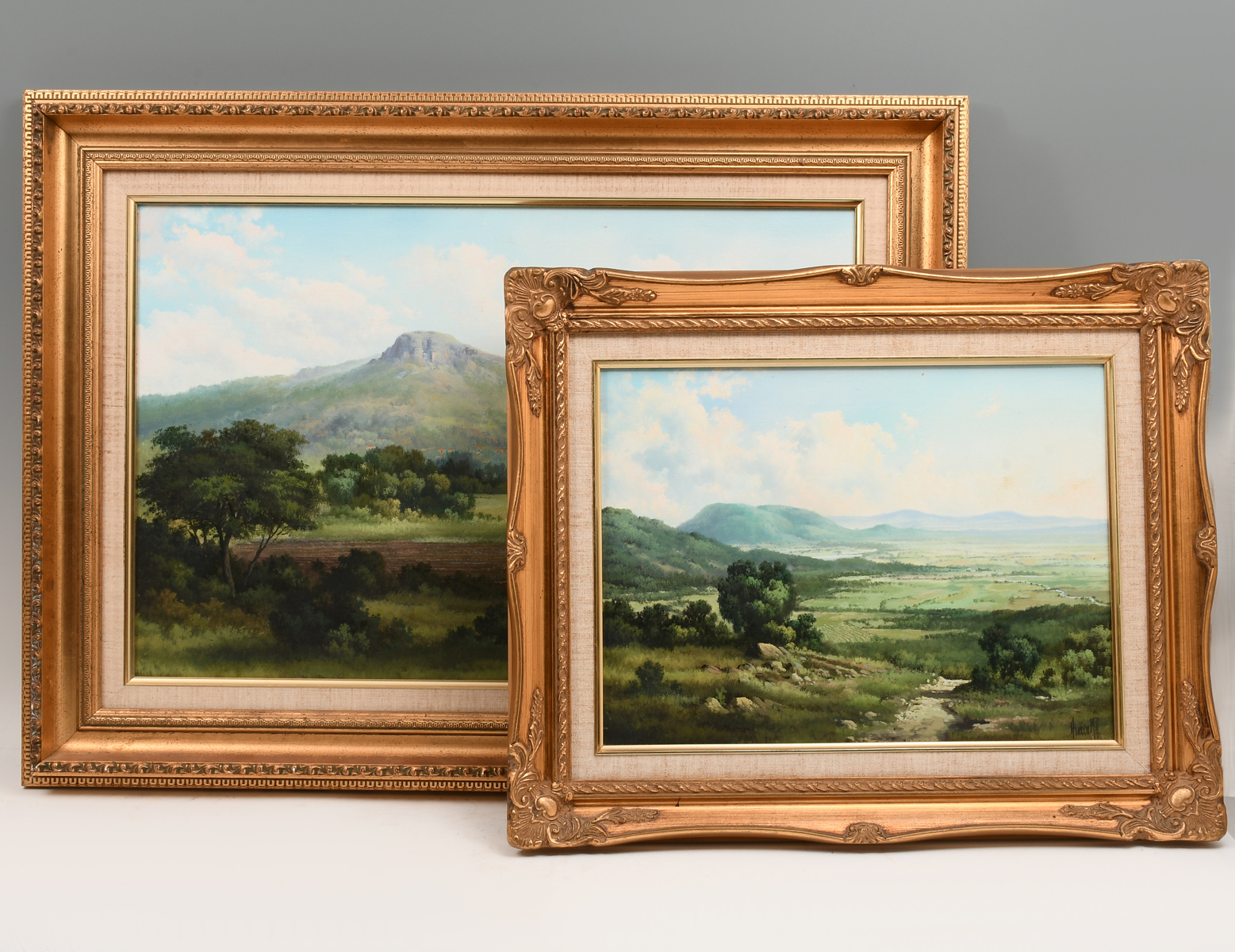 Appraisal: TWO FINE PANORAMIC LANDSCAPES SIGNED OROZCO Lush Green Valley Landscape