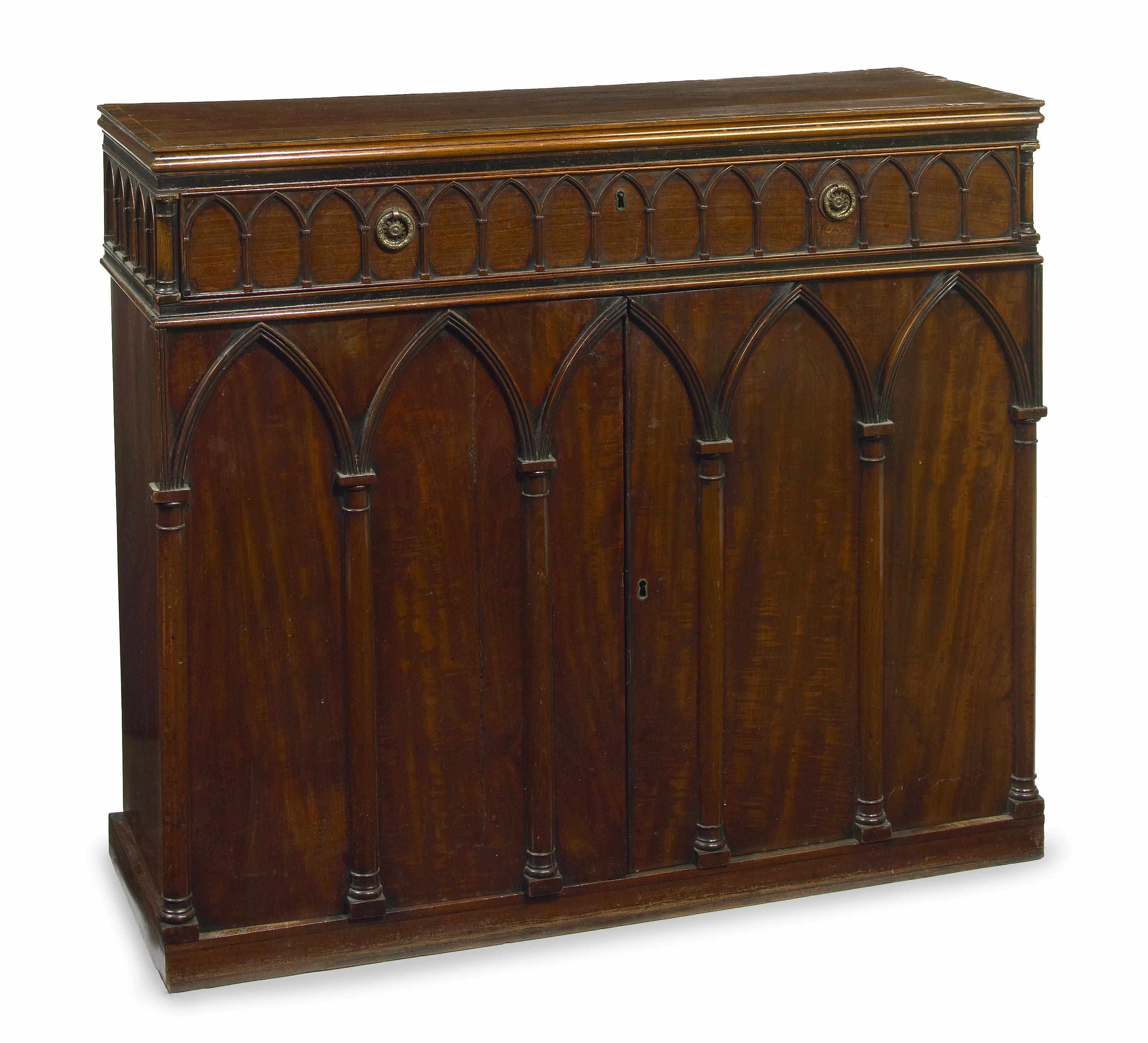 Appraisal: A Regency Gothic Revival parcel ebonized mahogany side cupboard first