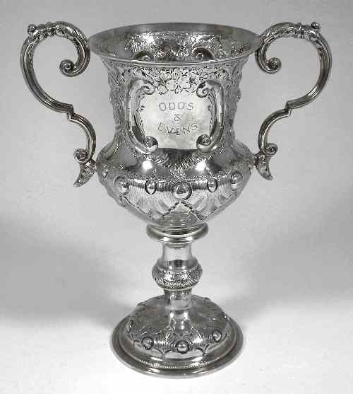 Appraisal: A Victorian silver two-handled prize cup the body embossed with