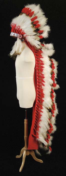 Appraisal: PLAINS INDIANS STYLE HEADDRESS TRAILER The fully feathered headdress is