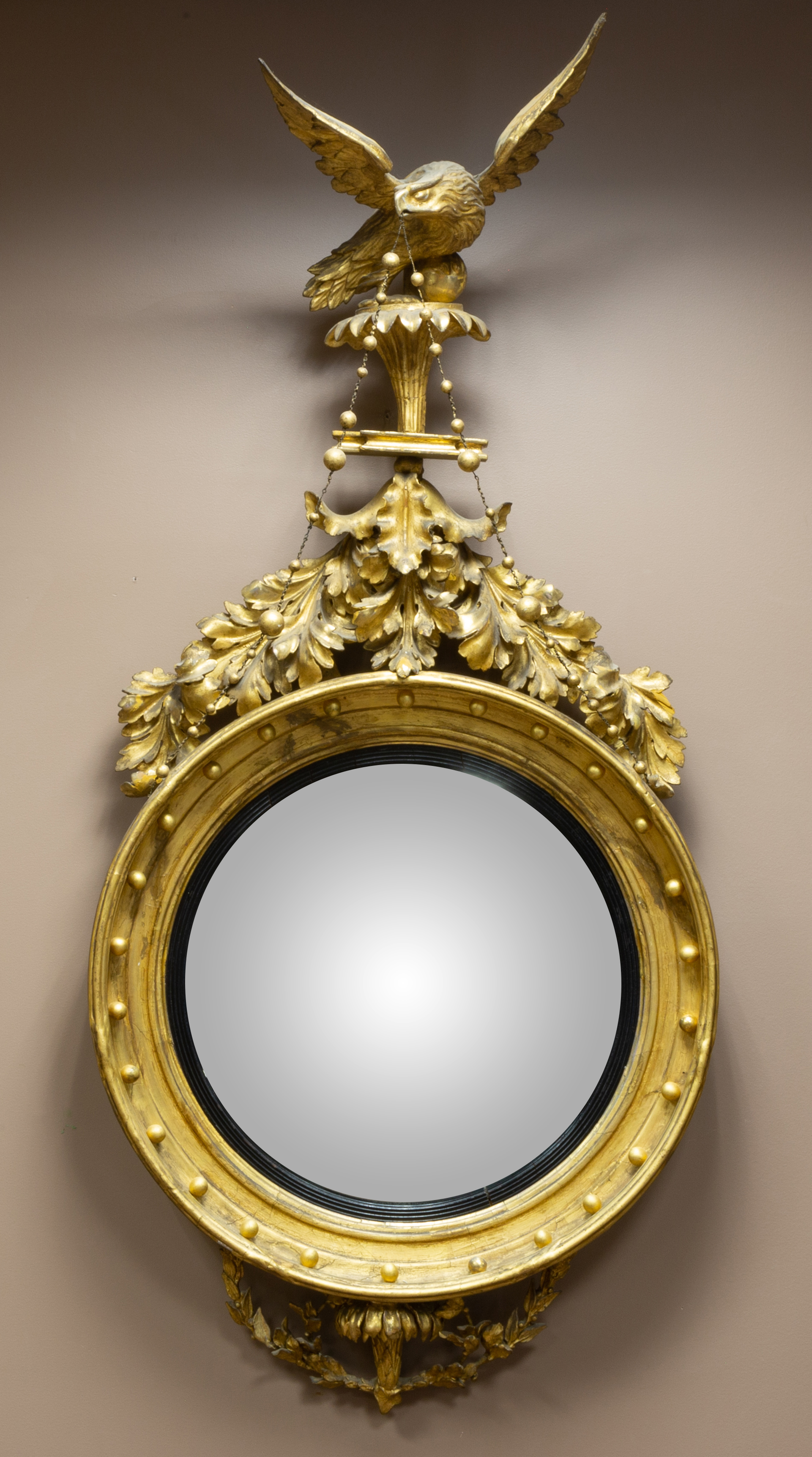 Appraisal: CARVED AND GILTWOOD GIRANDOLE MIRROR Early th century with carved