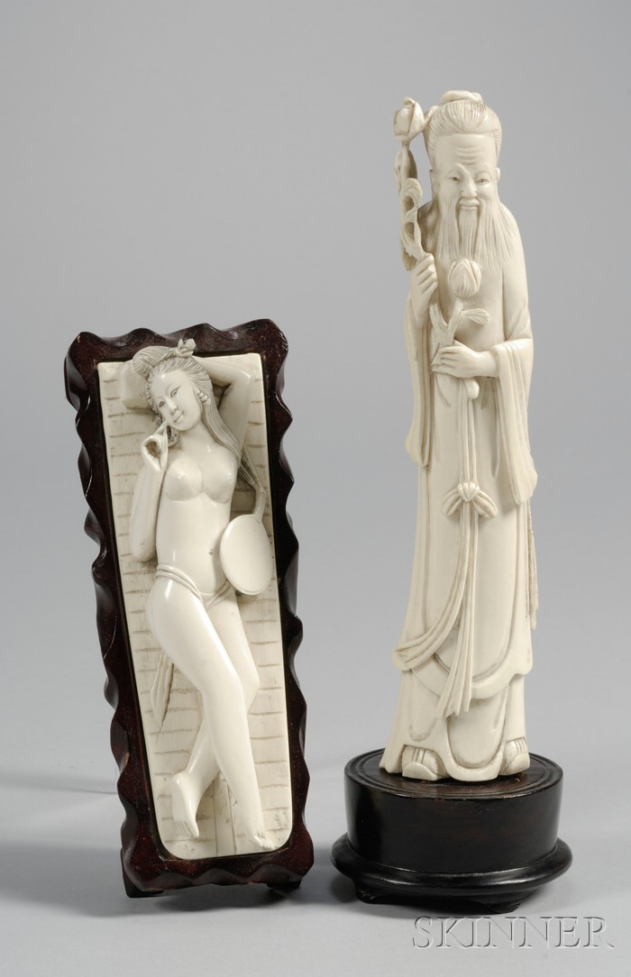 Appraisal: Two Chinese Ivory Carvings a standing figure of an Immortal