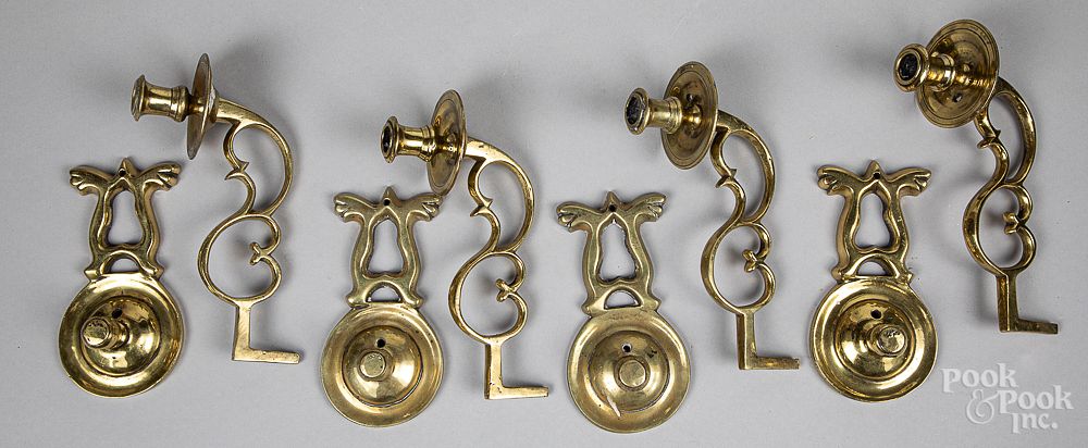 Appraisal: Set of four brass wall sconces etc Set of four