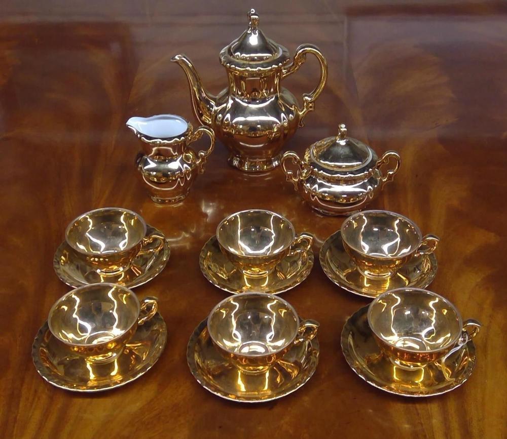 Appraisal: Japanese Gilt Porcelain -Piece Demitasse Set