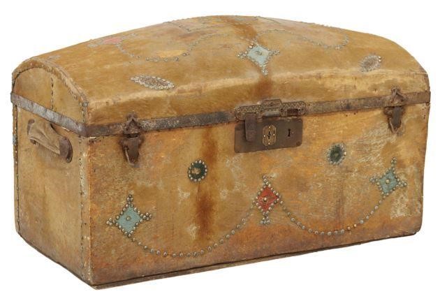 Appraisal: American cowhide-clad travel trunk th c nailhead trim with initials