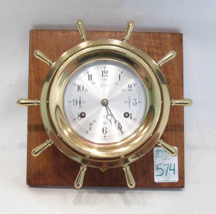 Appraisal: SALEM SHIP'S BELL CLOCK in ship's wheel brass case mounted