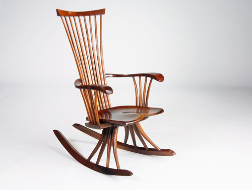 Appraisal: JEFFREY GREENE Solid walnut rocking chair with corseted spindles all