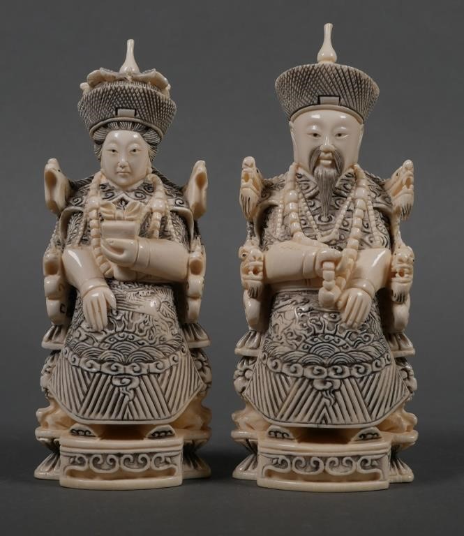 Appraisal: Chinese figural pair carved ivory Signed on bottoms Measure about