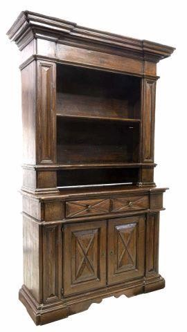 Appraisal: Continental Baroque style walnut bookcase th c molded cornice over