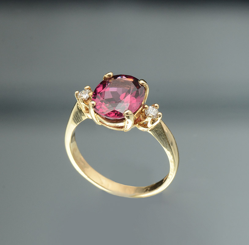 Appraisal: K FEATURING CT RHODALITE GARNET Sweet ring features large garnet