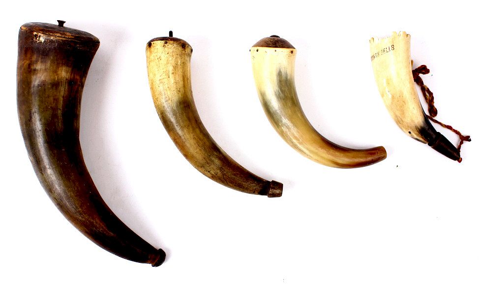 Appraisal: Four Assorted Carved Powder Primer Horns For your bidding pleasure