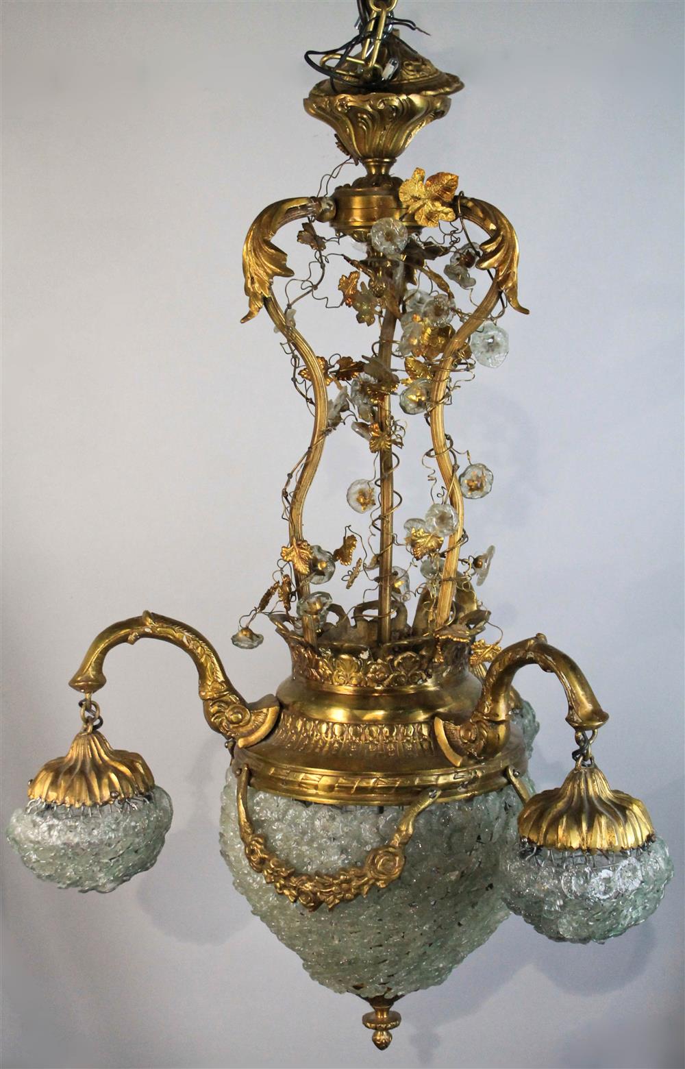 Appraisal: GILT METAL AND GLASS CHANDELIER with open frame applied with