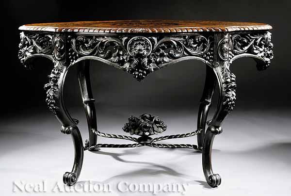 Appraisal: A Rococo Revival Carved and Inlaid Walnut Center Table spurious