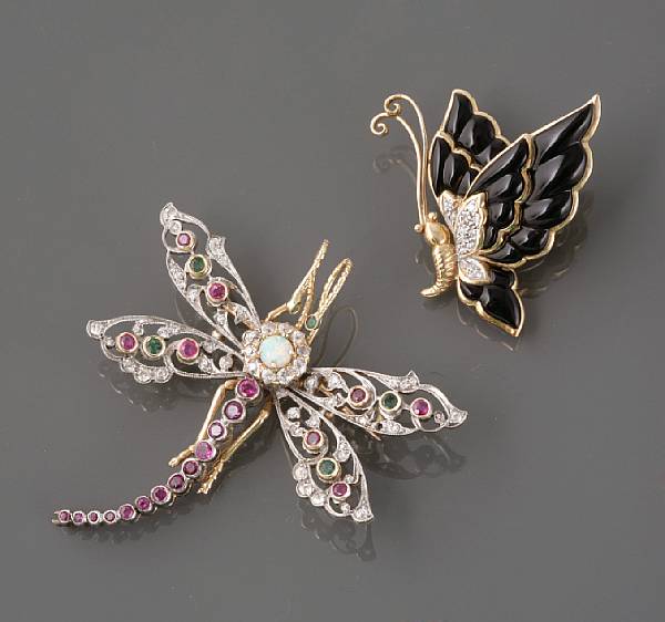 Appraisal: A collection of two onyx gem-set diamond and gold butterfly