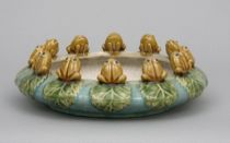 Appraisal: An Antique Majolica Bowl Twelve frogs grace the rim of