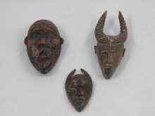 Appraisal: Three African miniature wooden masks