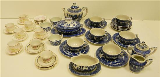 Appraisal: Minitature porcelain teacups and saucers along with blue and white