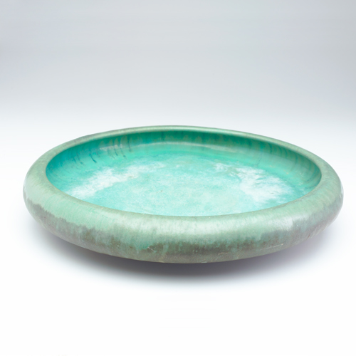 Appraisal: FULPER Oversized low bowl covered in Cucumber Matte green glaze