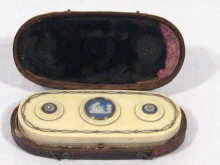 Appraisal: A gold and ivory toothpick box in original Morocco case