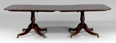 Appraisal: Regency two-pedestal dining table each pedestal with figured mahogany top