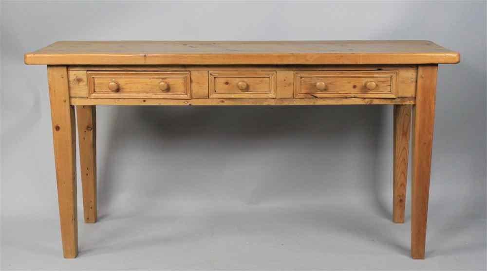 Appraisal: PROVINCIAL PINE SIDE TABLE the rectangular top with three panel-carved