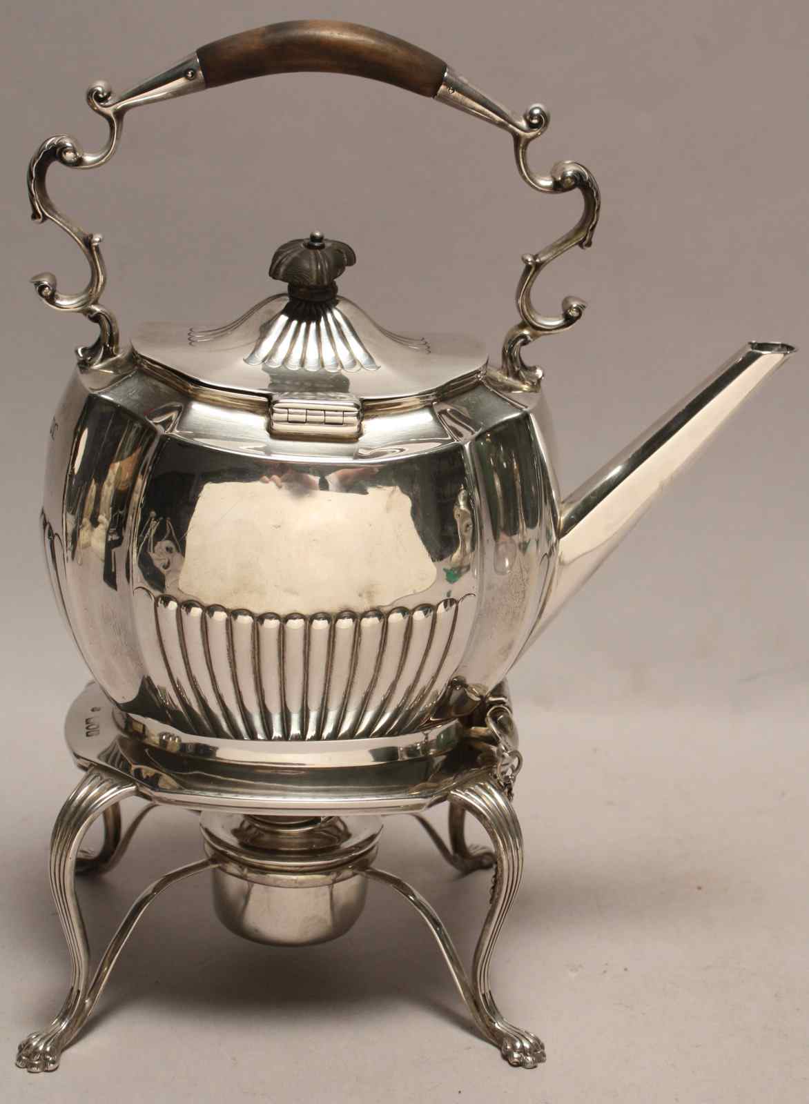 Appraisal: ENGLISH SILVER TEA KETTLE ON STANDLondon In half-rib form with