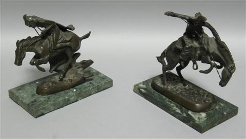 Appraisal: PAIR OF REMINGTON STYLE PATINATED BRONZE FIGURES Cast as a