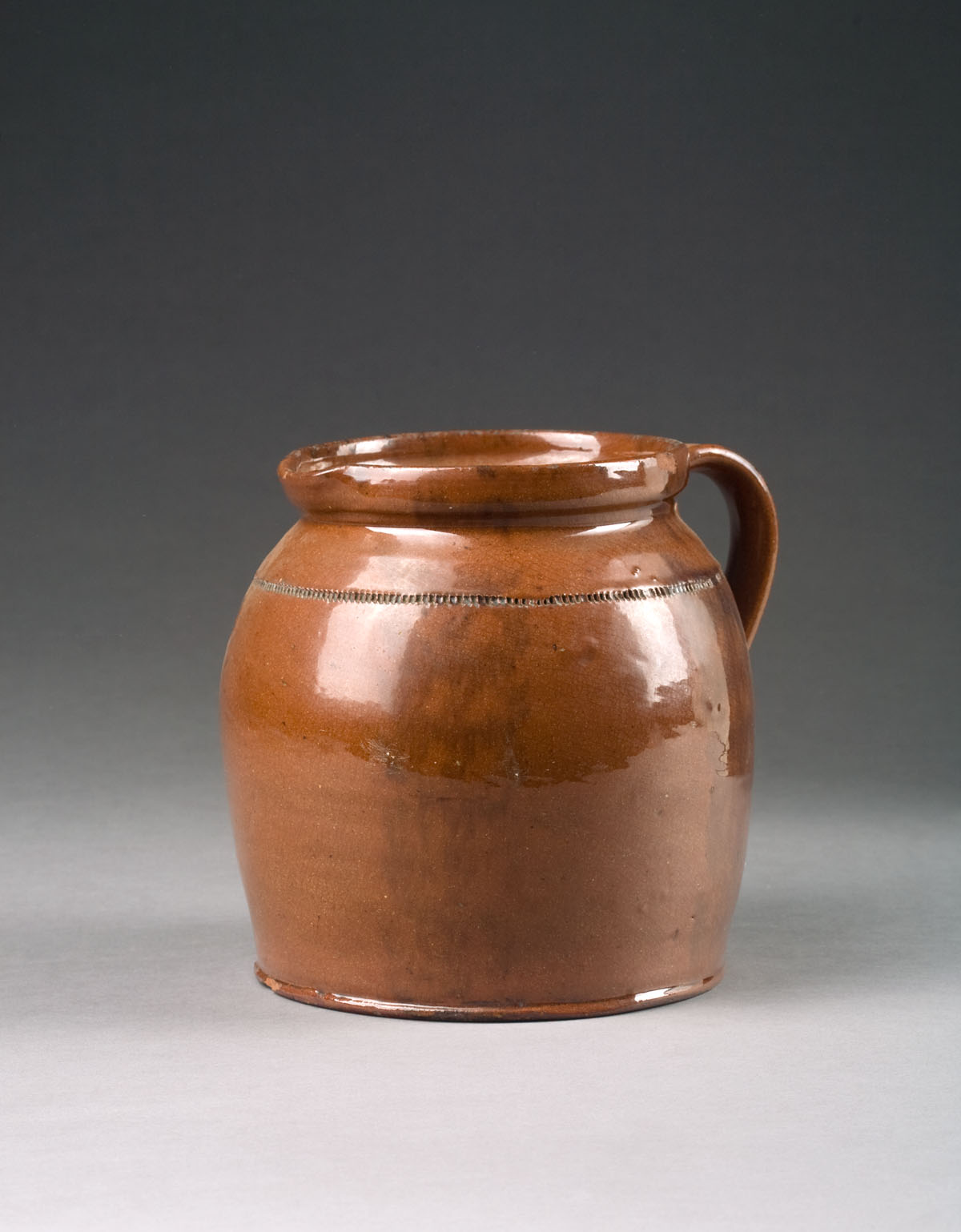 Appraisal: AMERICAN GLAZED REDWARE PITCHER POSSIBLY NEW YORK OR PENNSYLVANIA NINETEENTH