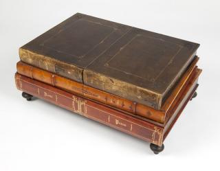 Appraisal: A leather bound book th century a low cocktail table