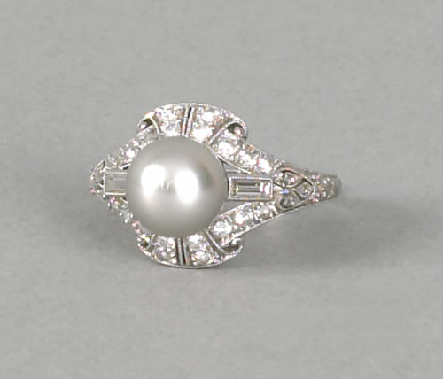 Appraisal: Platinum pearl and diamond ring with center gray pearl surrounded