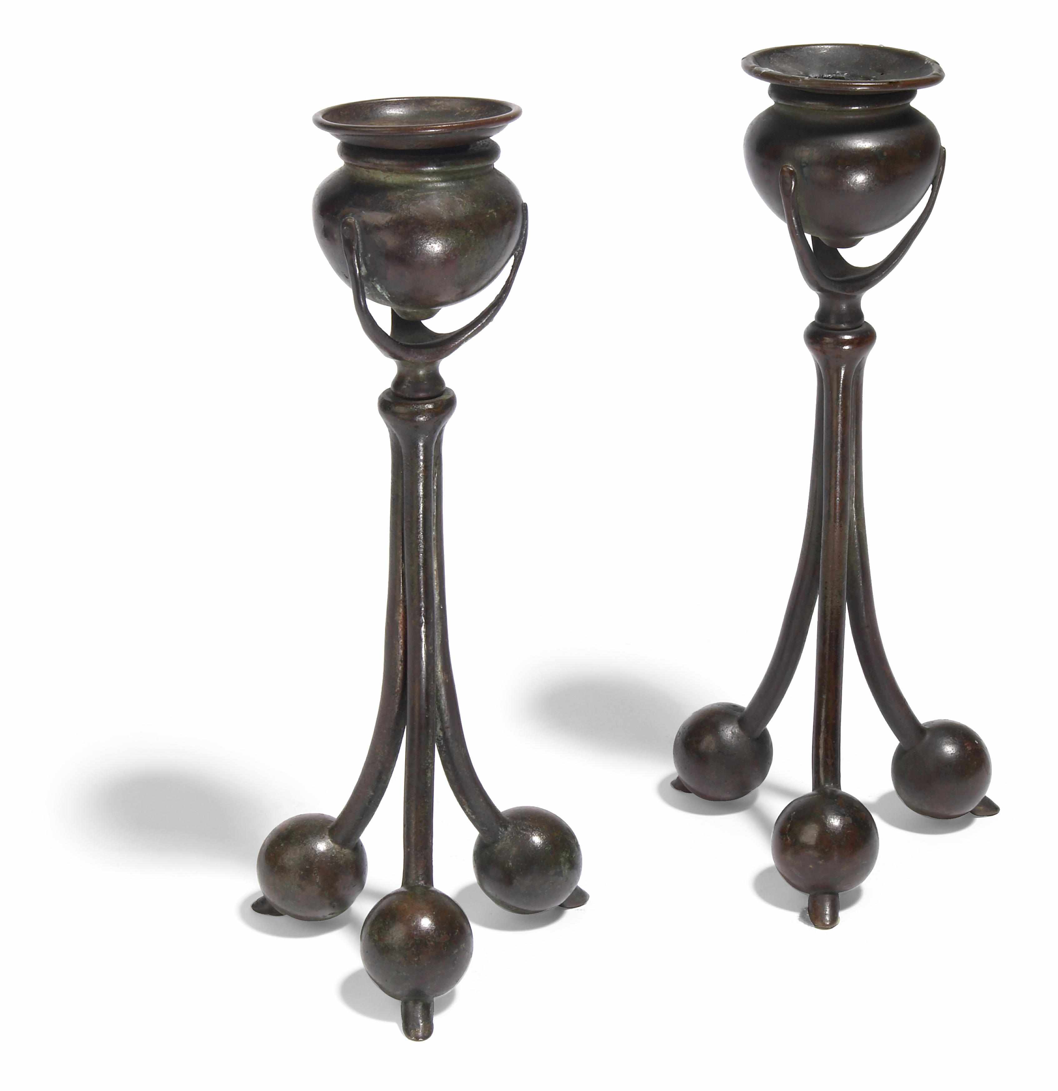 Appraisal: A pair of Tiffany Studios bronze ball candlesticks - one