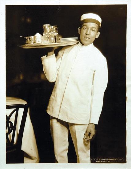 Appraisal: HUGHES Langston Photograph of Langston Hughes as a bus boy