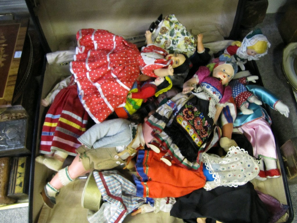 Appraisal: Suitcase of assorted costume dolls