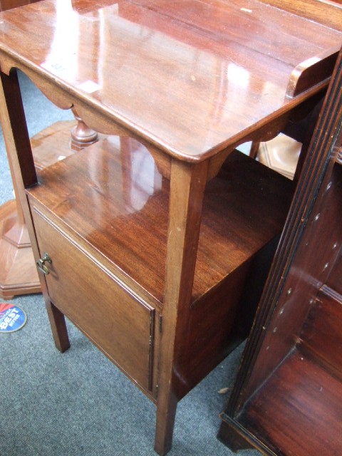 Appraisal: A mahogany pot cupboard with open shelf over cupboard and