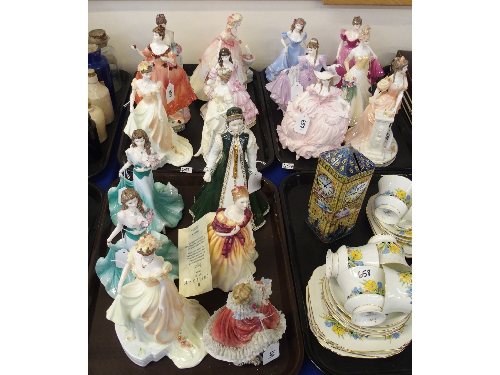 Appraisal: Three trays comprising various Coalport porcelain figures of ladies and