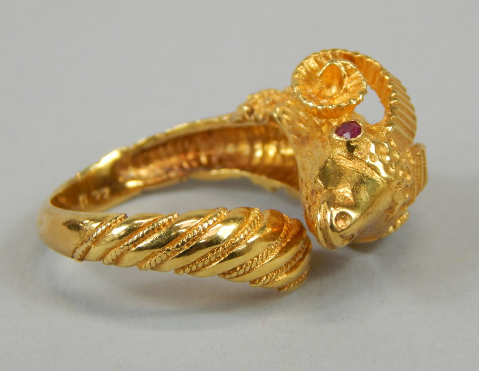 Appraisal: A ram's head ring the head set with two rubies