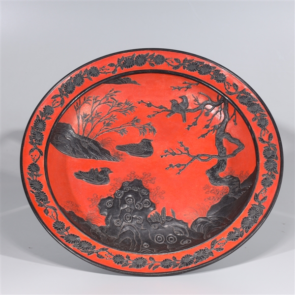 Appraisal: Chinese red and black porcelain charger with birds foliate and