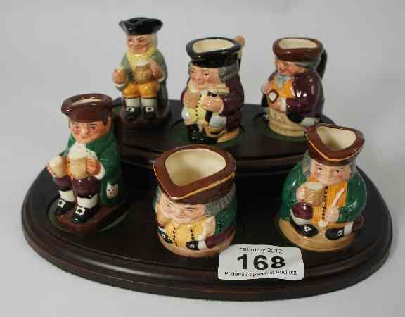 Appraisal: Royal Doultom Tinies Toby Jugs Happy John D Jolly Toby