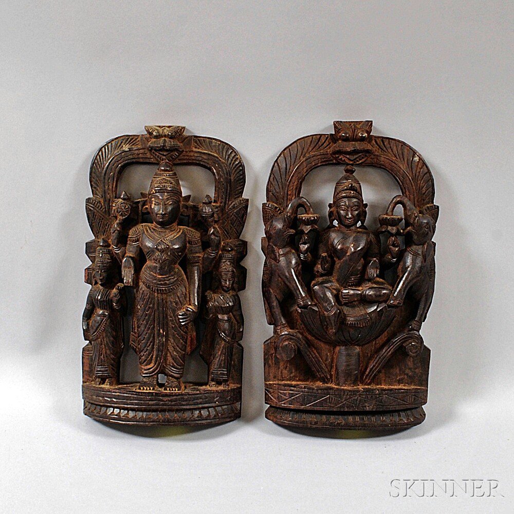 Appraisal: Two Indian Wood Carvings one depicting Avalokitesvara seated with two